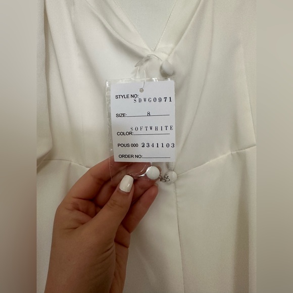 Brand new wedding dress with tags - Picture 6 of 7